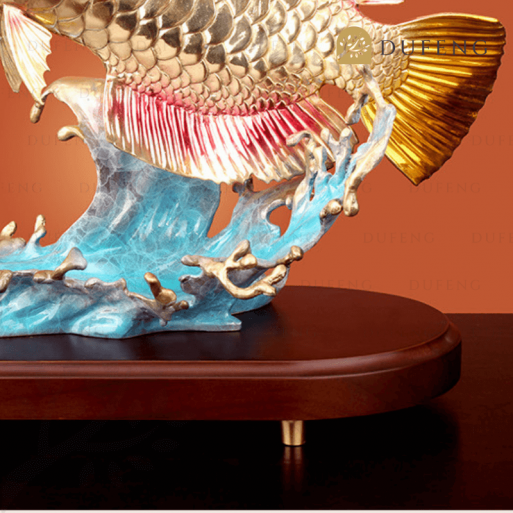 Golden Arwana With Lucky Coin